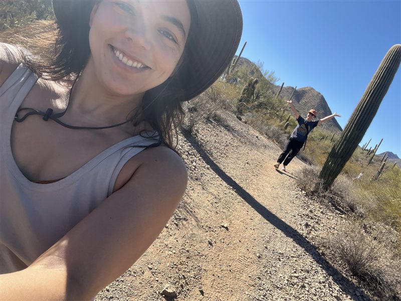 Vanessa smiling on a desert trail near Tucson